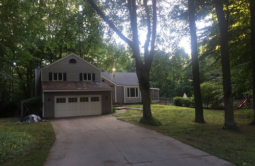 Macatawa House | Large family home with private POOL and hot tub on heavily wooded lot