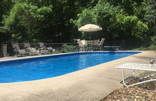 Macatawa House | Large family home with private POOL and hot tub on heavily wooded lot