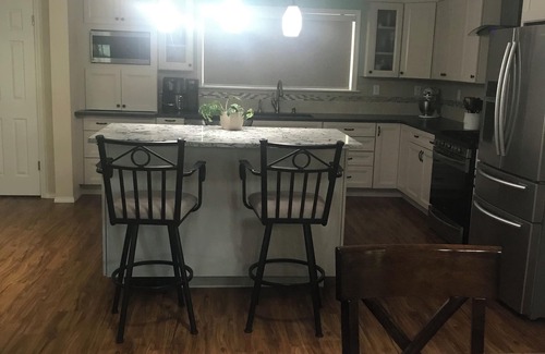 Longmont House | Large, lovely home with open living/kitchen/dining space and 2 King bedrooms.