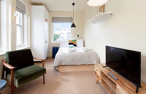 Camden Town with Primrose Hill Apartment | Large Studio in Heritage Building Near Camden