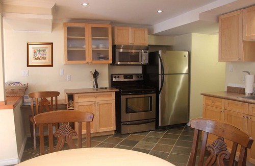 District of North Vancouver House | Large Whistleresque walk out Garden suite & beautifully landscaped yard