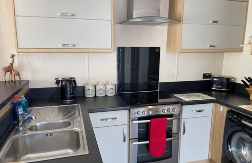 Hamworthy House | Larkspur lovely dog friendly caravan at Rockley Park, Poole Harbour, Dorset.