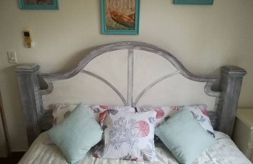 Playa Coronado Bed & Breakfast | Las Olas room - King size bed with private bathroom by the beach.