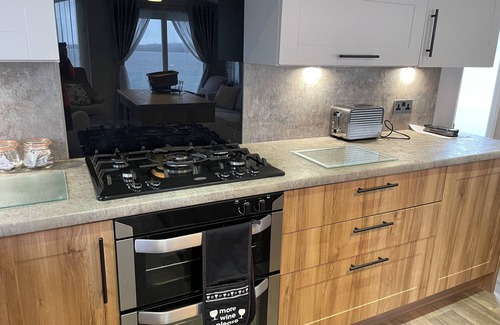 Hamworthy House | Lavender super front row sea view caravan at Rockley Park, Poole Harbour, Dorset