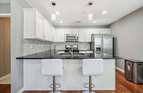 Lowry Hill East House | Lavish 1BR/1.5BA Room in Shared Home w/Rooftop