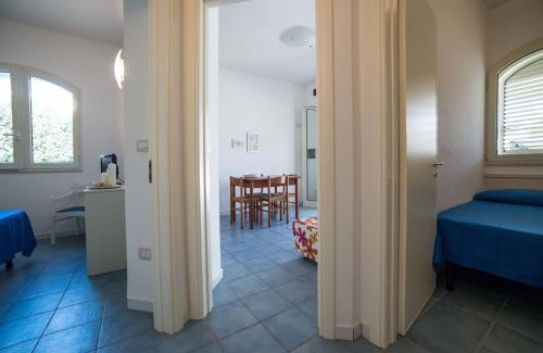 Torre Suda Apartment | Le Bianche ville con patio privato a un passo dal mare