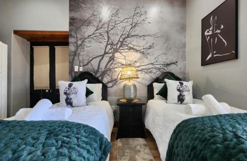 Malmesbury Apartment | Le Graan Guestroom