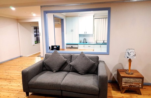 Culburra Beach House | Let the waves hit your feet, let the sand be your seat!nbeach across the road!