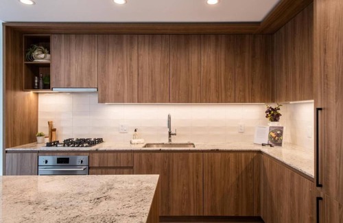 Killgubbin Hotel | Level Spacious one bedroom suite with king bed, walk-in closet, full kitchen.