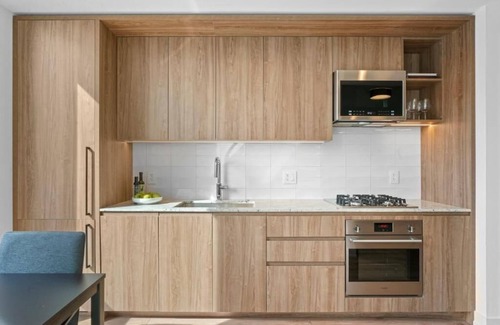 Killgubbin Hotel | Level Spacious one bedroom suite with king bed, walk-in closet, full kitchen.