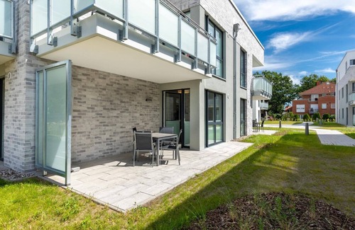 Boltenhagen Apartment | Lichtdurchflutetes Apartment mit Sonniger Terrasse und nur 200 m zum Strand - Aparthotel Ostseeallee