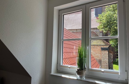 Schleswig Apartment | Lichtdurchflutete Ferienwohnung mit Blick auf den Schleswiger Dom