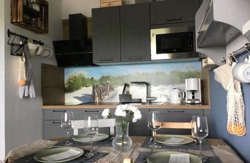 Dornum Apartment | Liebevoll eingerichtete Ferienwohnung Lüttje Koje