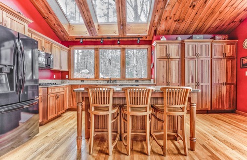 Barrington House | Light, airy, comfy, casual, wooded, lakefront home with private sandy beach