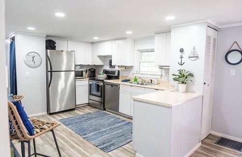 Fair Play House | Light & Airy Lakefront Home with Flat Yard, Private Dock, Deck & Screened Porch