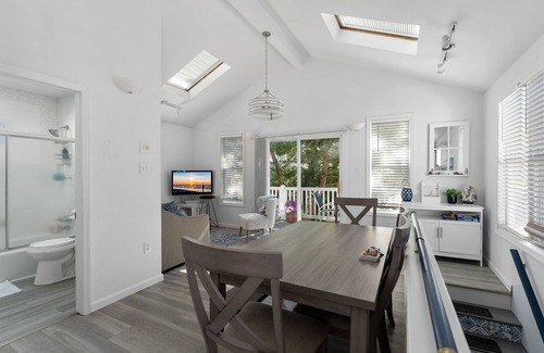 Townsend's Inlet Cottage | Light filled carriage house with gorgeous wrap around deck, ready for a perfect vacation getaway.