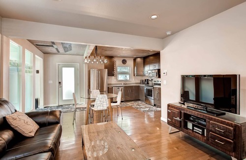 Colorado Springs House | Lightning Laboratory — electricity decor, mural ceiling, secret patio, W/D