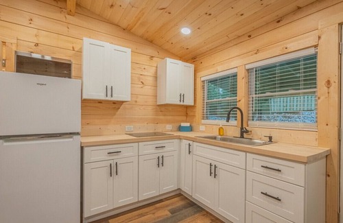 Gumlog House | "Lilliputian Hideaway: A Lakeside Dream"