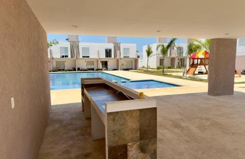 Puerto Juarez Villa | Linda casa frente a alberca en Playa del Carmen