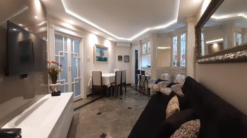 Gonzaga Apartment | Lindo Flat no Edifício Cosmopolitan, com GARAGEM e PISCINA