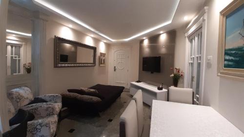Gonzaga Apartment | Lindo Flat no Edifício Cosmopolitan, com GARAGEM e PISCINA