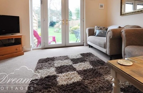 Wool Cottage | LITTLE ACRE, pet friendly, with a garden in Wool