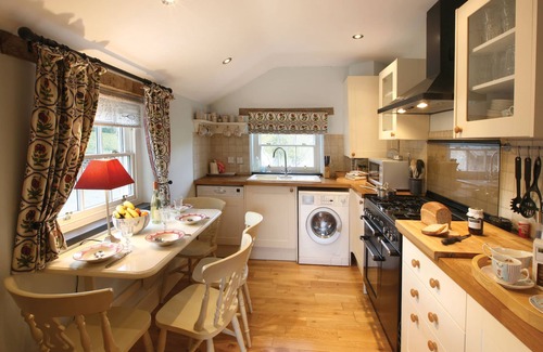 Eglwysbach Cottage | Lletty - An historic three-storey Grade II stone holiday farmhouse dating from the 17th century