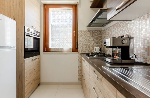 Is Mirrionis Apartment | Located in a quiet area of ​Cagliari, the apartment offers a welcoming accommodation ideal for those who want comfort and relaxation. With a surface area of ​60 sqm, it is located on the first floor served by a lift and can accommodate up to 4