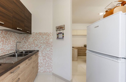 Is Mirrionis Apartment | Located in a quiet area of ​Cagliari, the apartment offers a welcoming accommodation ideal for those who want comfort and relaxation. With a surface area of ​60 sqm, it is located on the first floor served by a lift and can accommodate up to 4