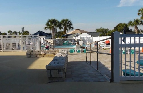 Gardens of Gulf Cove House | Located in an active community w/heated pools, tennis courts and shuffleboard
