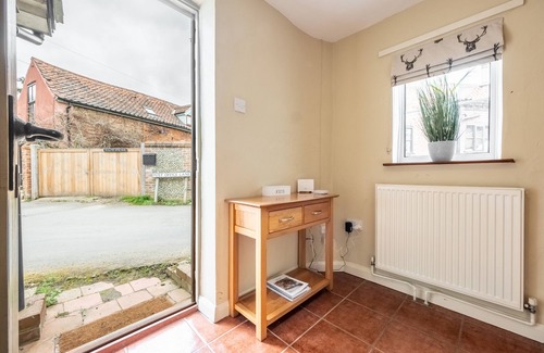 Saxthorpe Cottage | Located quietly and tucked away in the village of Saxthorpe, Inglenook, a semi-detached cottage dati