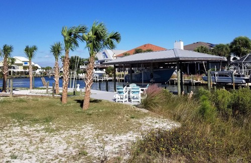 Perdido Key Coves One House | Location, location, location! Walk to the beach - dock boat in the back of house