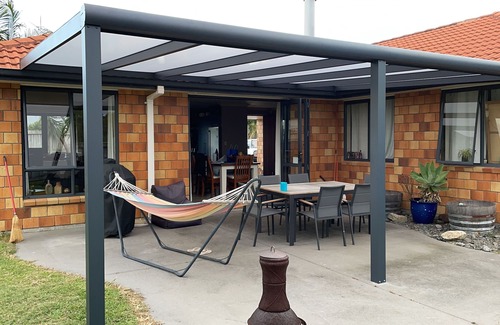 Papamoa Beach House | LOCATION. Location. Close to the beach and the reserve, private with a Spa.