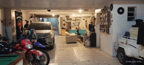 Fragata House | Loft Moto Garagem