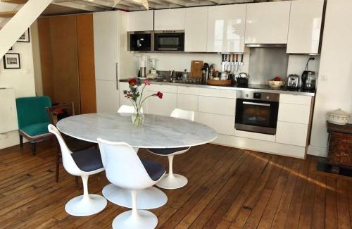 Quartier de la Folie-Mericourt Apartment | Loft style condo 4 people in central and trendy Paris