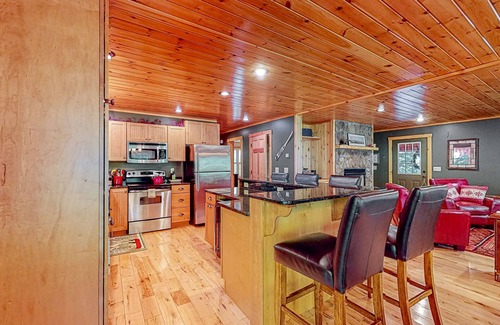 Sunday River Area Ski Chalet | Log cabin 1 mile from Sunday River with hot tub, fireplace & Ping-Pong