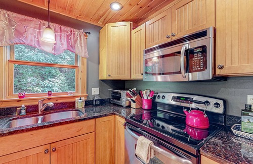 Sunday River Area Ski Chalet | Log cabin 1 mile from Sunday River with hot tub, fireplace & Ping-Pong