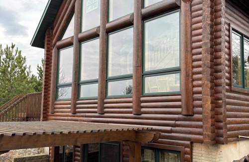 Danbury Cabin | Log Cabin 4-bedroom on water with dock, sand beach with AC, WiFi in Webster