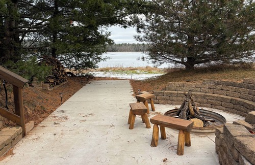 Danbury Cabin | Log Cabin 4-bedroom on water with dock, sand beach with AC, WiFi in Webster