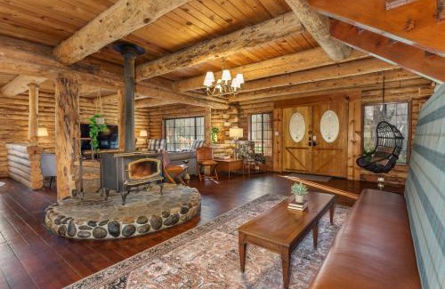 Ahwahnee House | Log Cabin sleeps 20 with hot tub, EV Charger, firepit