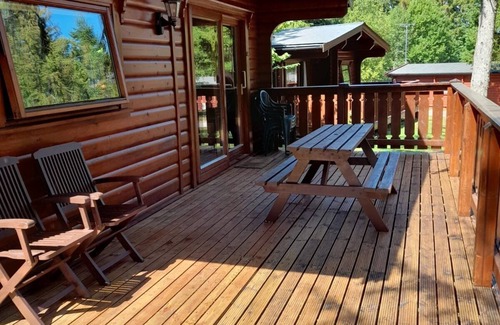 Kenwick Cabin | Log cabin with decked veranda, nestled in Kenwick Park, Louth