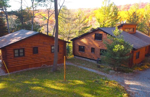 Windermere Cottage | Log home & guest cottage in old forest, Waterfall, Sunsets, Sauna, Fishing Boat