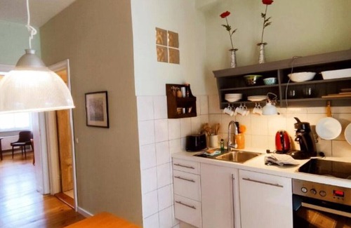 Rheinsberg Condo | LoggiaHaus am Schloss, apartment Pünktchen, 1st floor, loggia Partly furnished. Castle view