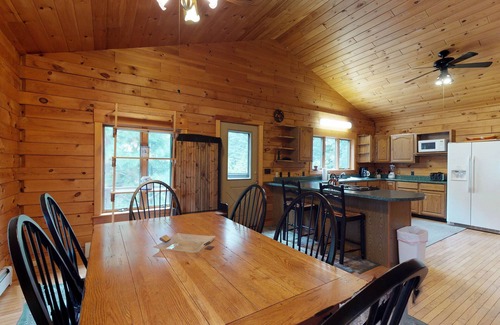 Greenville Junction Cabin | LogHome on Moosehead Lake w/Seasonal Dock, Pebble Beach, Firepit & Spacious Deck