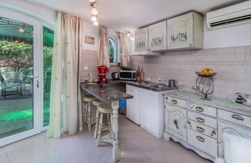 Bregi Apartment | Look forward to a relaxing vacation in this comfortable vacation home with pool access.