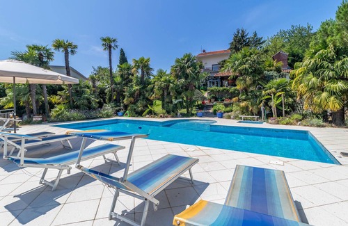 Bregi Apartment | Look forward to a relaxing vacation in this comfortable vacation home with pool access.