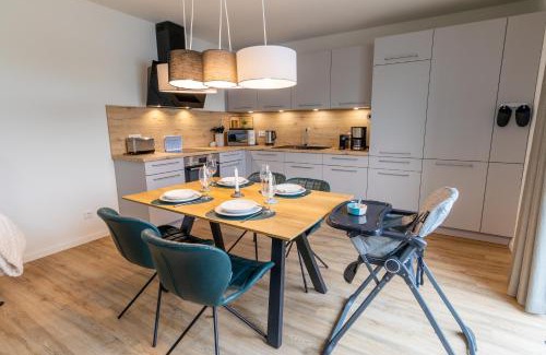 Tossens Apartment | Lotta – Familienfreundliche Ferienwohnung mit Sauna & nah am Strand!