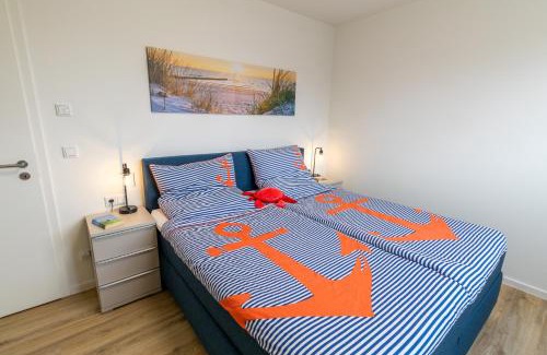 Tossens Apartment | Lotta – Familienfreundliche Ferienwohnung mit Sauna & nah am Strand!