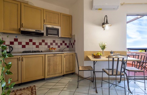 Canneddi Apartment | Lovely apartment for 4 people with A/C, pool, WIFI, TV, terrace, pets allowed and parking