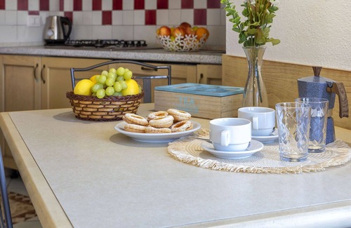 Canneddi Apartment | Lovely apartment for 4 people with A/C, pool, WIFI, TV, terrace, pets allowed and parking